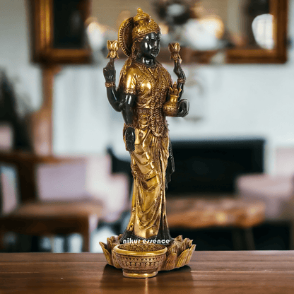 Buy Brass Lakshmi Statue online,Standing on Lotus in Black and Golden Goddess Dhana Traditional Hindu Religious Figurine with Intricate Detailing Nikuressence