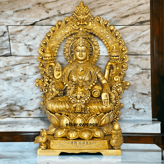 Pure Brass Lakshmi Seated on Lotus Throne with Kirtimukha Prabhawali , Hindu Divine Artwork for Home Altar Decor and Spiritual Grace Nikuressence