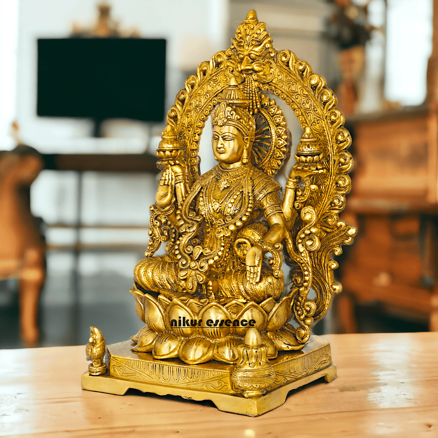 Pure Brass Lakshmi Seated on Lotus Throne with Kirtimukha Prabhawali , Hindu Divine Artwork for Home Altar Decor and Spiritual Grace Nikuressence