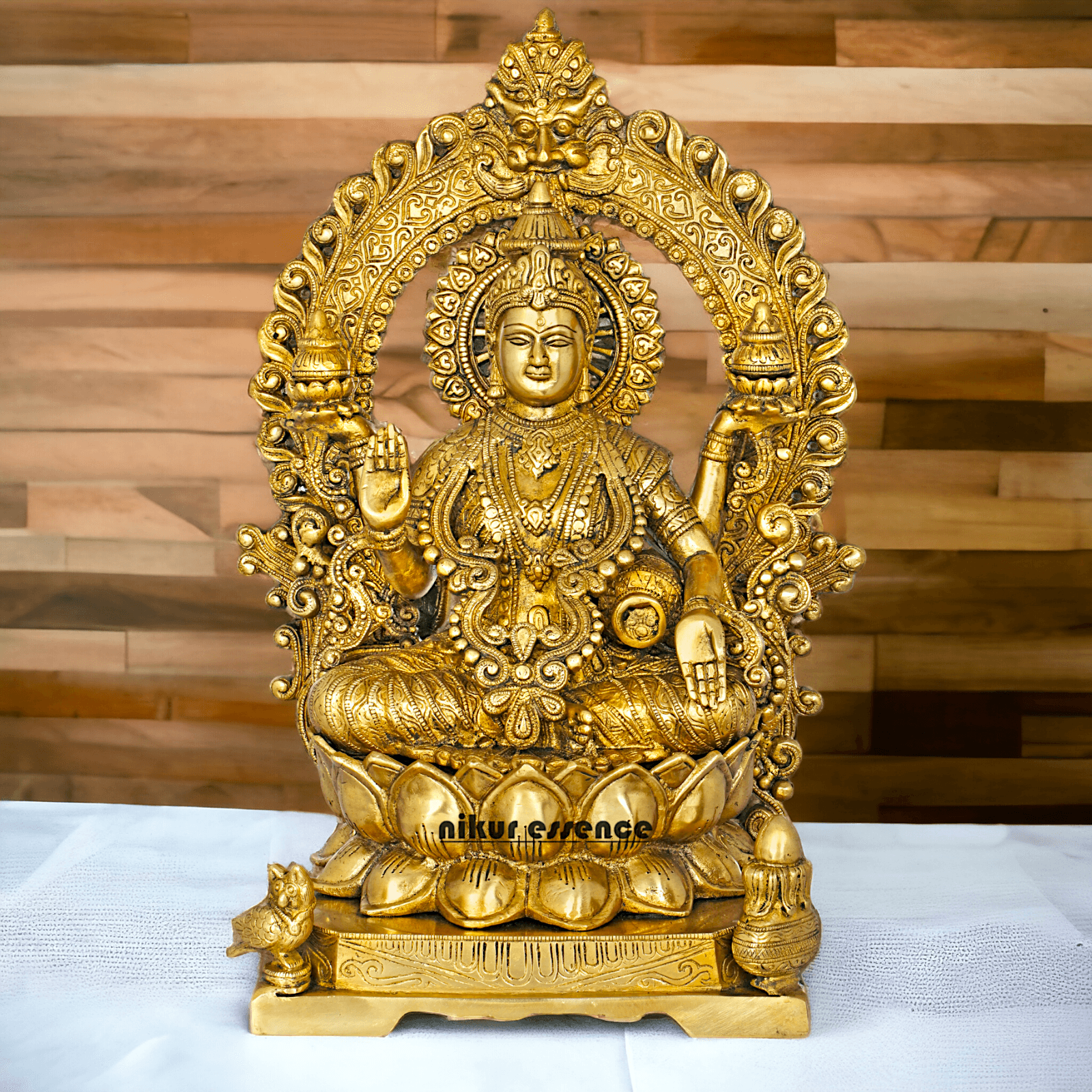 Pure Brass Lakshmi Seated on Lotus Throne with Kirtimukha Prabhawali , Hindu Divine Artwork for Home Altar Decor and Spiritual Grace Nikuressence