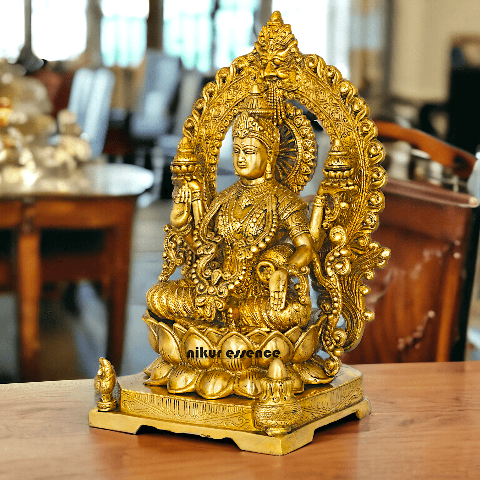 Pure Brass Lakshmi Seated on Lotus Throne with Kirtimukha Prabhawali , Hindu Divine Artwork for Home Altar Decor and Spiritual Grace Nikuressence