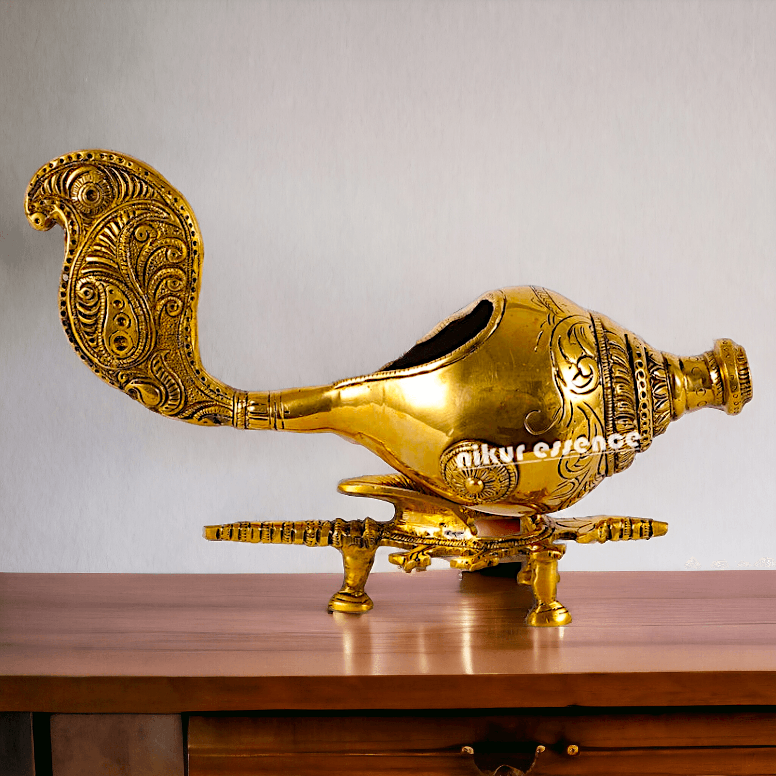Buy Brass Showpiece Shankh with Elegant Stand – Ideal for Home Décor, Spiritual Enhancements, and Traditional Gifts Nikuressence