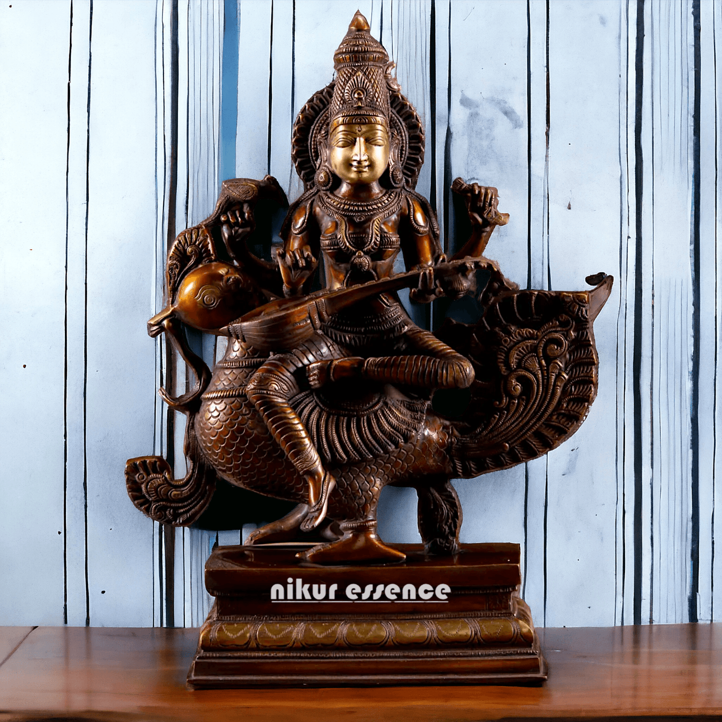 Brass Statue of Hindu Goddess Saraswati, the Patron of Wisdom, Playing Veena atop a Majestic Peacock with a Parrot Perched on Her Hand, 20 Inches Nikuressence