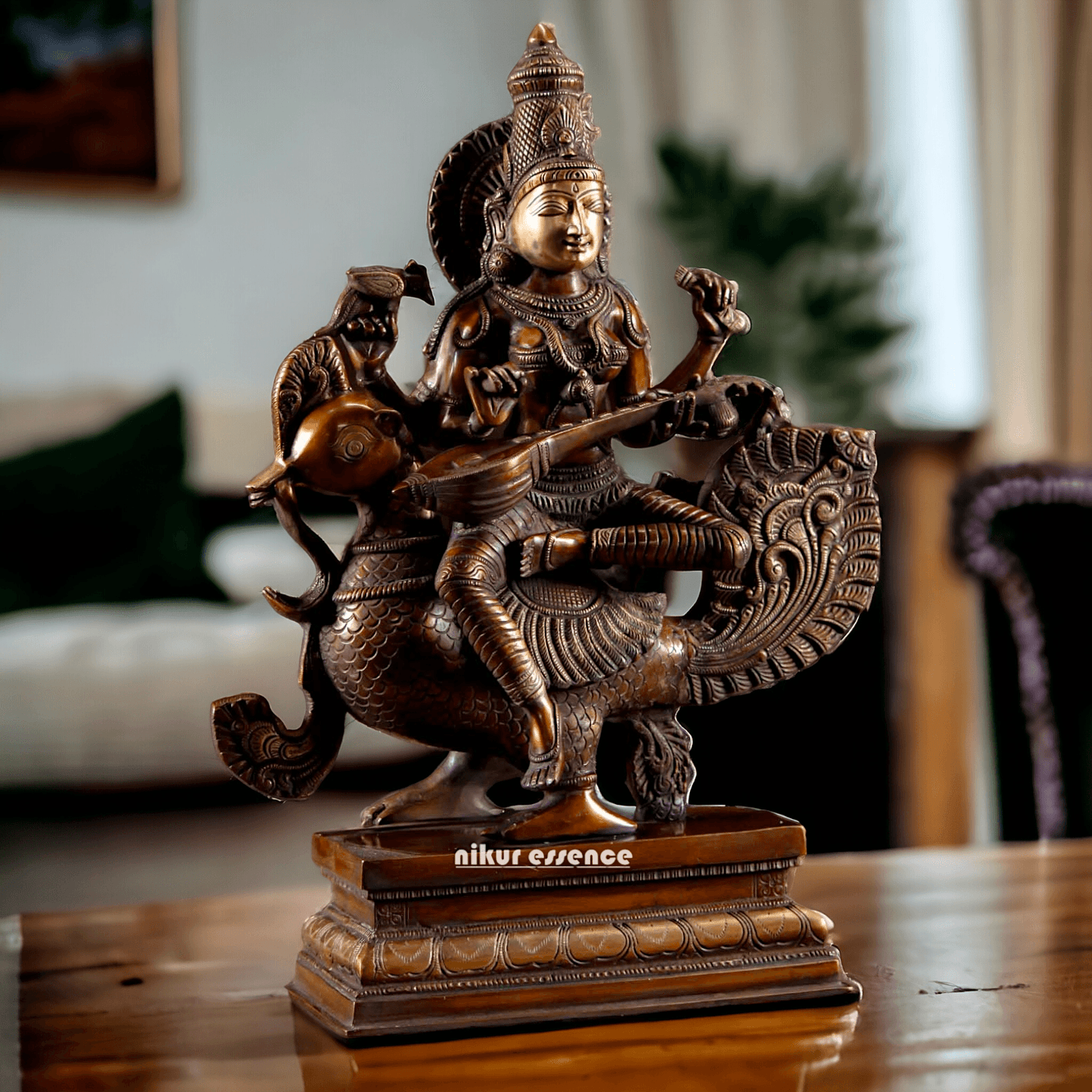 Brass Statue of Hindu Goddess Saraswati, the Patron of Wisdom, Playing Veena atop a Majestic Peacock with a Parrot Perched on Her Hand, 20 Inches Nikuressence
