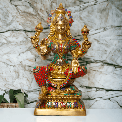 Buy Online Brass Statue of Lakshmi, Sitting Gracefully with Four Arms, Adorned with Intricate Inlay Work Nikuressence
