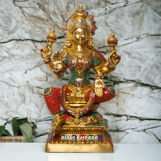 Buy Online Brass Statue of Lakshmi, Sitting Gracefully with Four Arms, Adorned with Intricate Inlay Work Nikuressence