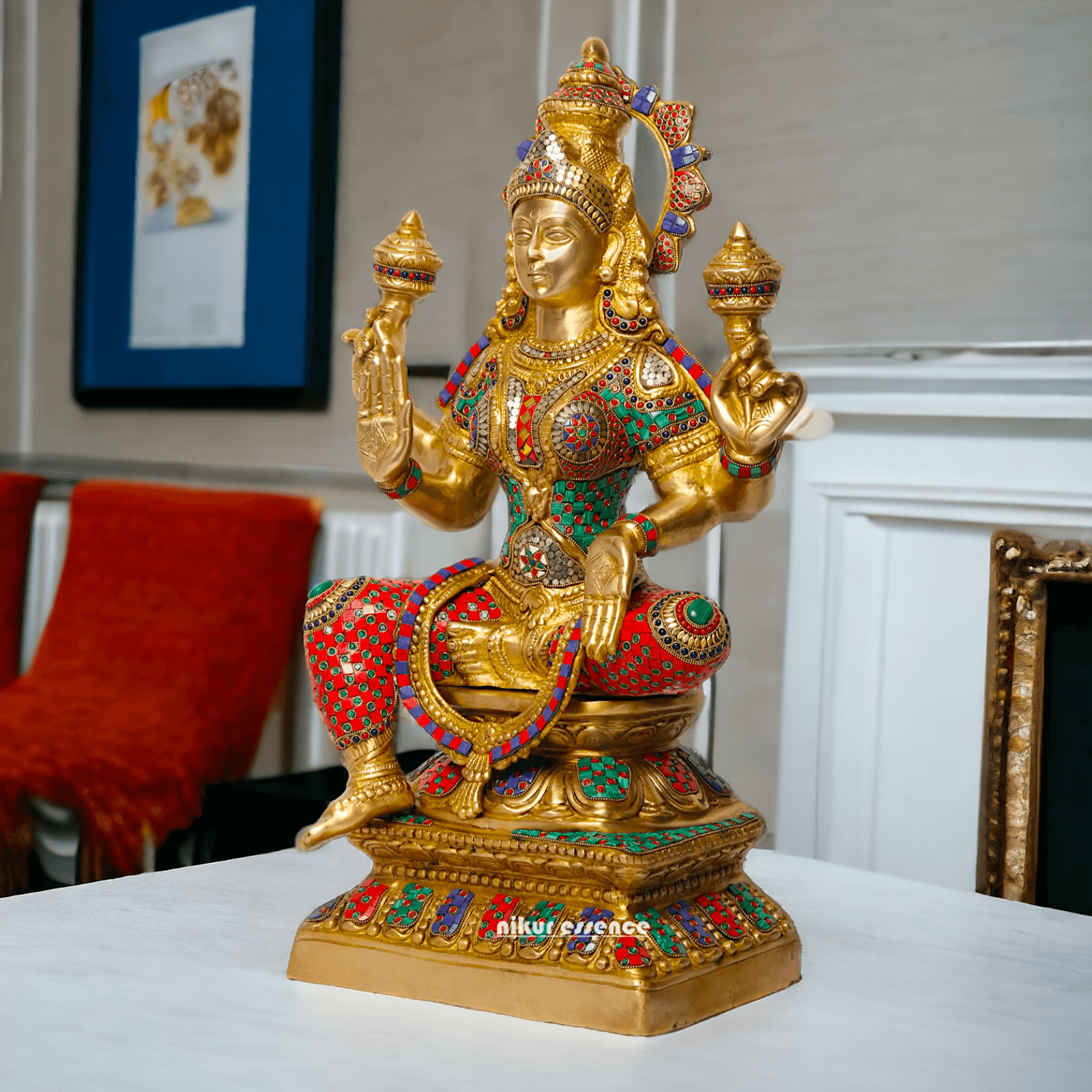 Buy Online Brass Statue of Lakshmi, Sitting Gracefully with Four Arms, Adorned with Intricate Inlay Work Nikuressence