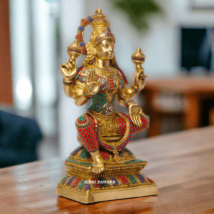 Buy Online Brass Statue of Lakshmi, Sitting Gracefully with Four Arms, Adorned with Intricate Inlay Work Nikuressence