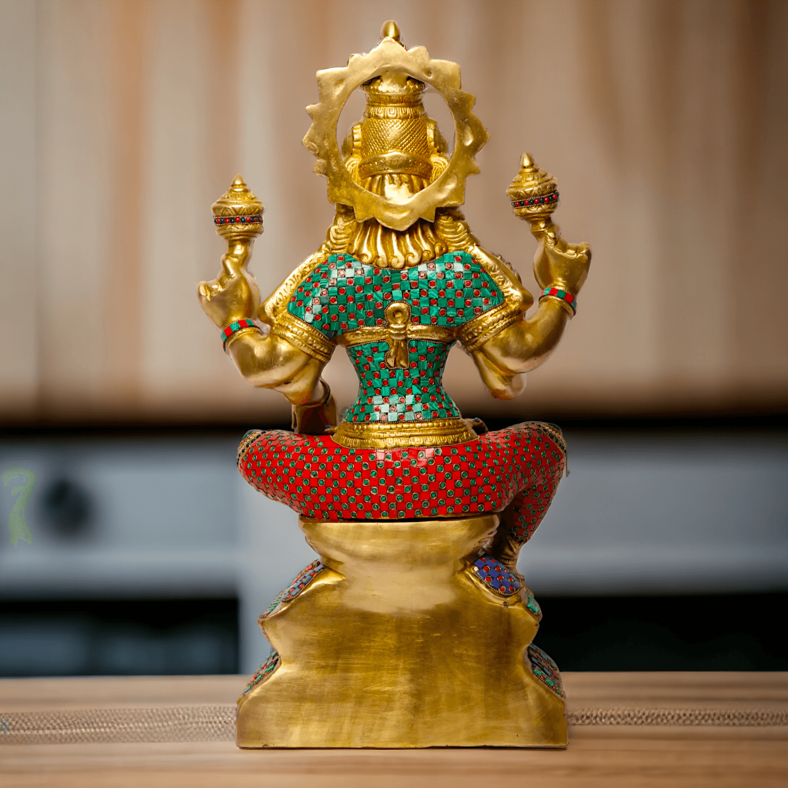 Buy Online Brass Statue of Lakshmi, Sitting Gracefully with Four Arms, Adorned with Intricate Inlay Work Nikuressence