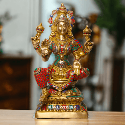 Buy Online Brass Statue of Lakshmi, Sitting Gracefully with Four Arms, Adorned with Intricate Inlay Work Nikuressence