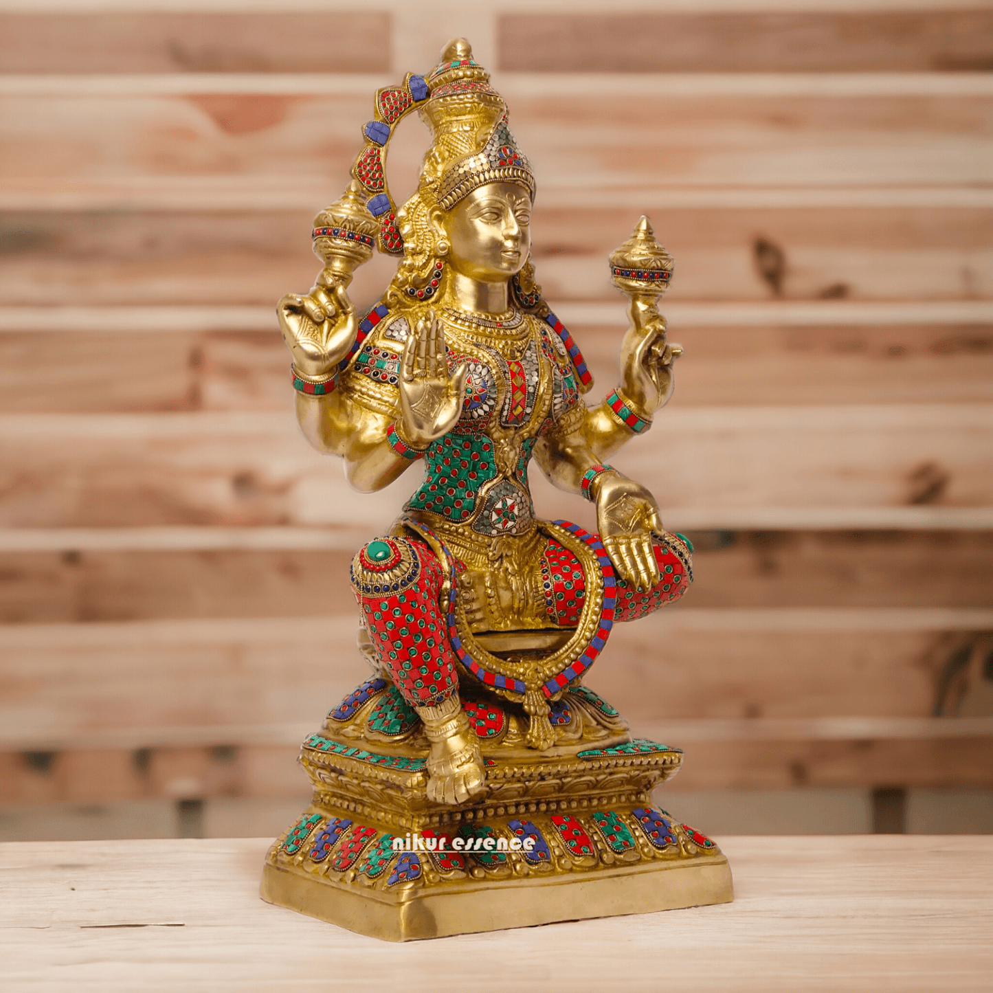 Buy Online Brass Statue of Lakshmi, Sitting Gracefully with Four Arms, Adorned with Intricate Inlay Work Nikuressence