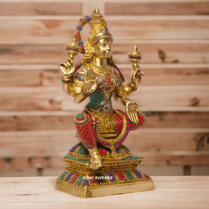 Buy Online Brass Statue of Lakshmi, Sitting Gracefully with Four Arms, Adorned with Intricate Inlay Work Nikuressence