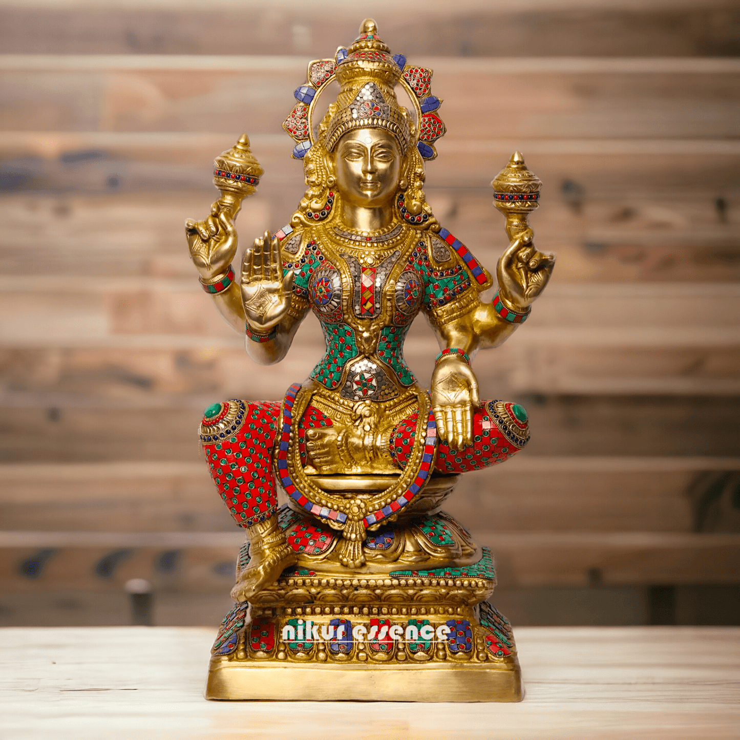 Buy Online Brass Statue of Lakshmi, Sitting Gracefully with Four Arms, Adorned with Intricate Inlay Work Nikuressence