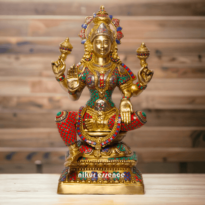 Buy Online Brass Statue of Lakshmi, Sitting Gracefully with Four Arms, Adorned with Intricate Inlay Work Nikuressence