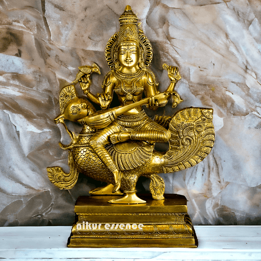 Buy Brass Statue of Devi Sarasvati Seated Gracefully on Her Sacred Peacock Nikuressence
