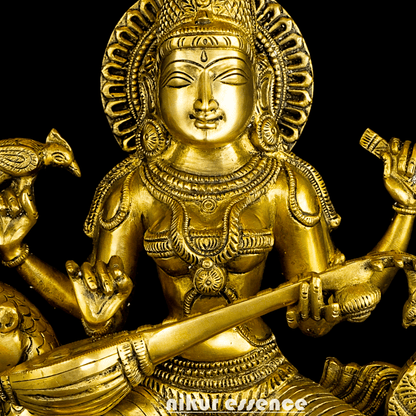 Buy Brass Statue of Devi Sarasvati Seated Gracefully on Her Sacred Peacock Nikuressence