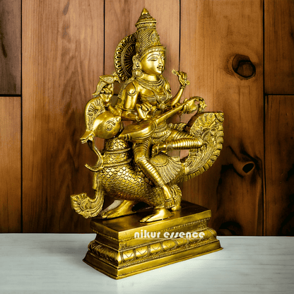 Buy Brass Statue of Devi Sarasvati Seated Gracefully on Her Sacred Peacock Nikuressence