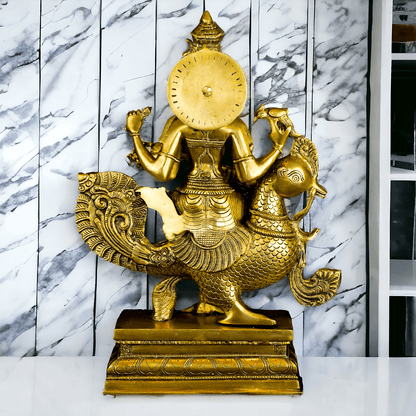 Buy Brass Statue of Devi Sarasvati Seated Gracefully on Her Sacred Peacock Nikuressence