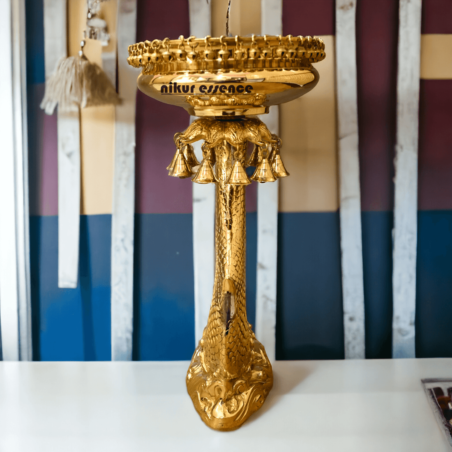 Buy urli stand Brassl on Fish Stand with Intricately Designed Hanging Bells and Ghungroos - Perfect for Traditional Decor and Festive Occasions Nikuressence