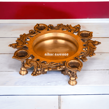Brass Urli with Intricately Designed 4 Diya Holders for Festive Decor and Spiritual Ambiance Nikuressence