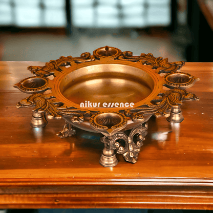 Brass Urli with Intricately Designed 4 Diya Holders for Festive Decor and Spiritual Ambiance Nikuressence