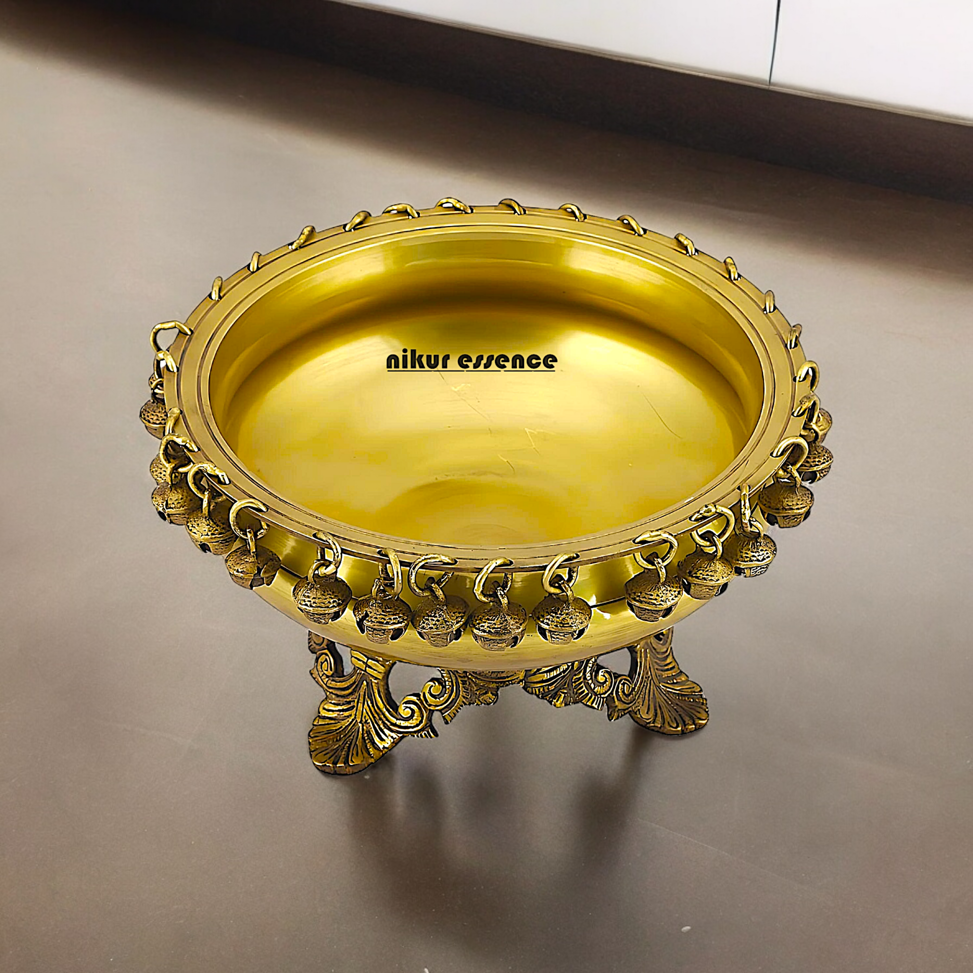 Buy Brass Round Urli with Hanging Bells Nikuressence