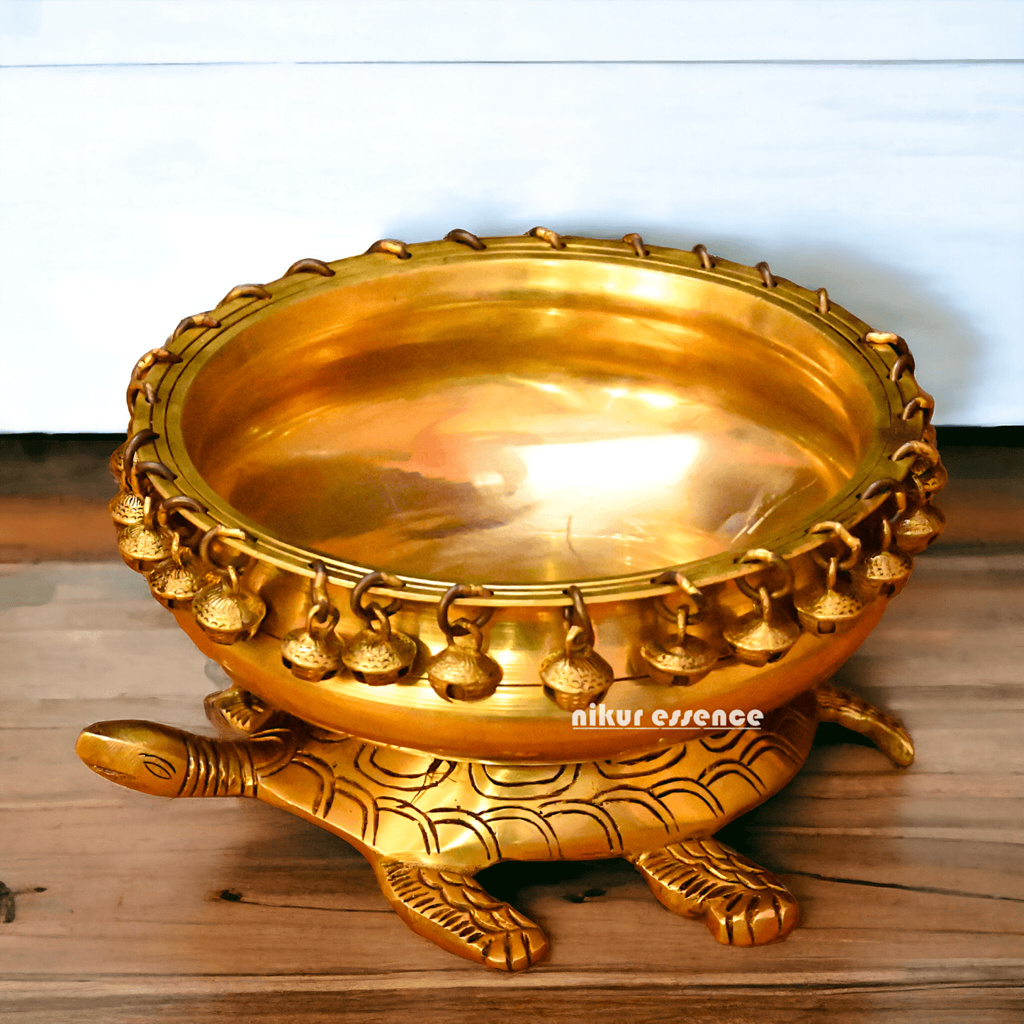 Buy online 8-Inch Traditional Brass Urli with Turtle Design - Handcrafted Decorative Bowl for Home Décor Nikuressence