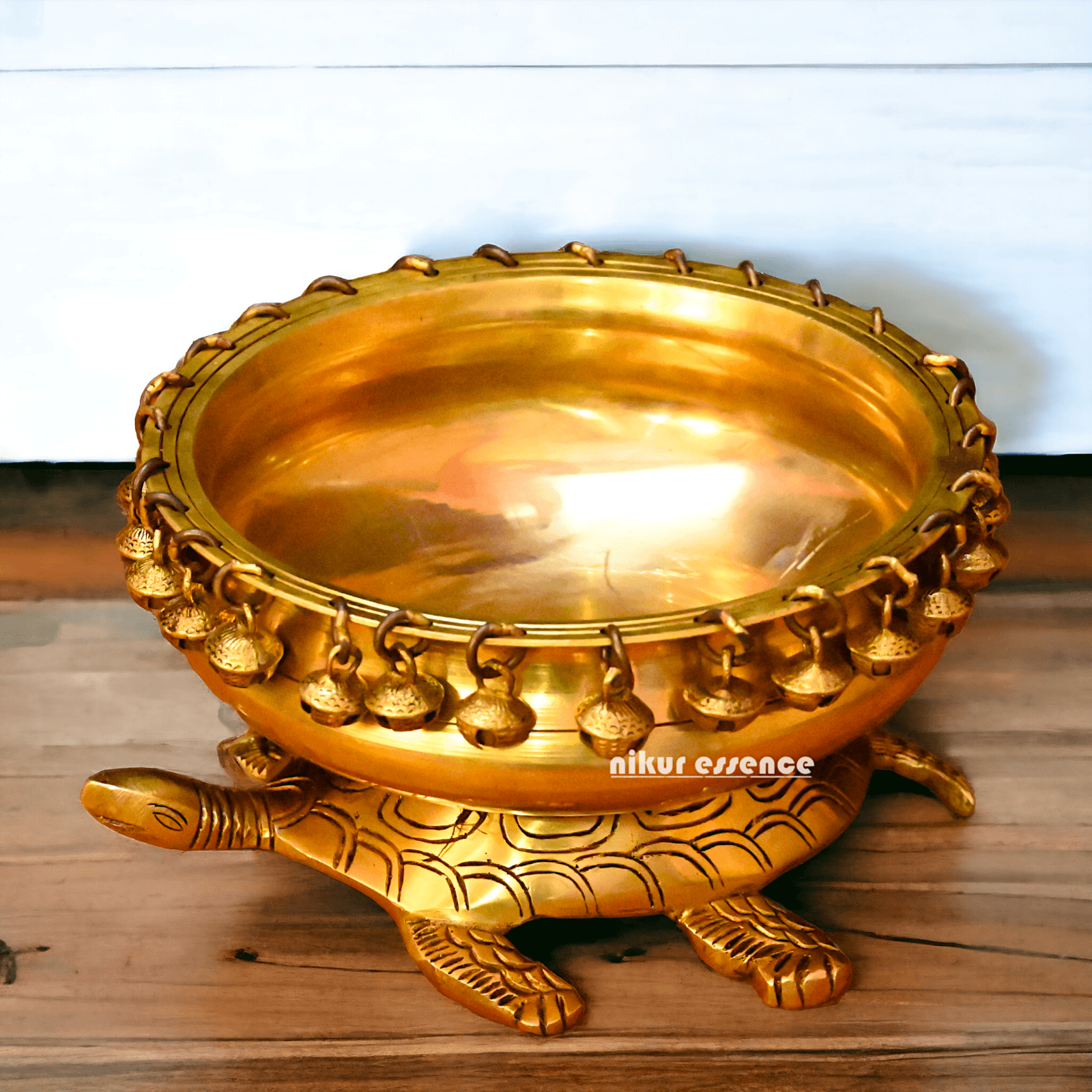 Buy online 8-Inch Traditional Brass Urli with Turtle Design - Handcrafted Decorative Bowl for Home Décor Nikuressence