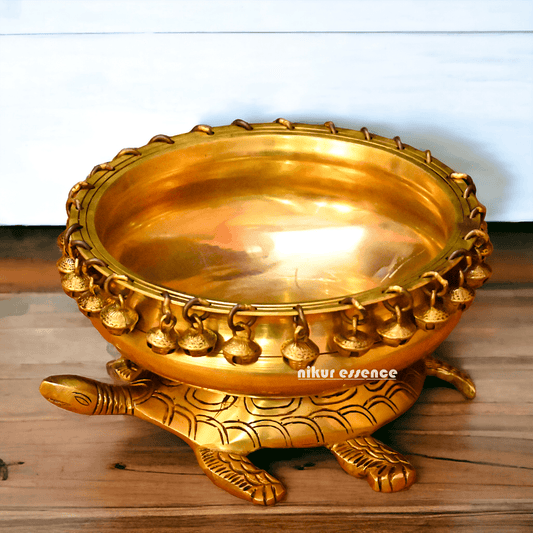Buy online 8-Inch Traditional Brass Urli with Turtle Design - Handcrafted Decorative Bowl for Home Décor Nikuressence