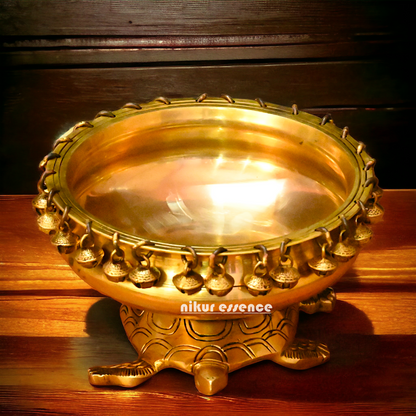 Buy online 8-Inch Traditional Brass Urli with Turtle Design - Handcrafted Decorative Bowl for Home Décor Nikuressence