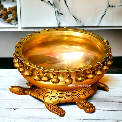 Buy online 8-Inch Traditional Brass Urli with Turtle Design - Handcrafted Decorative Bowl for Home Décor Nikuressence