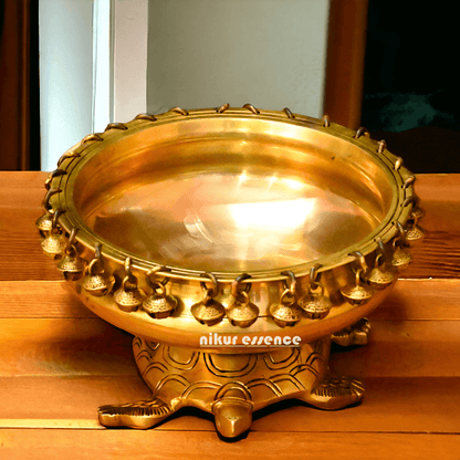 Buy online 8-Inch Traditional Brass Urli with Turtle Design - Handcrafted Decorative Bowl for Home Décor Nikuressence