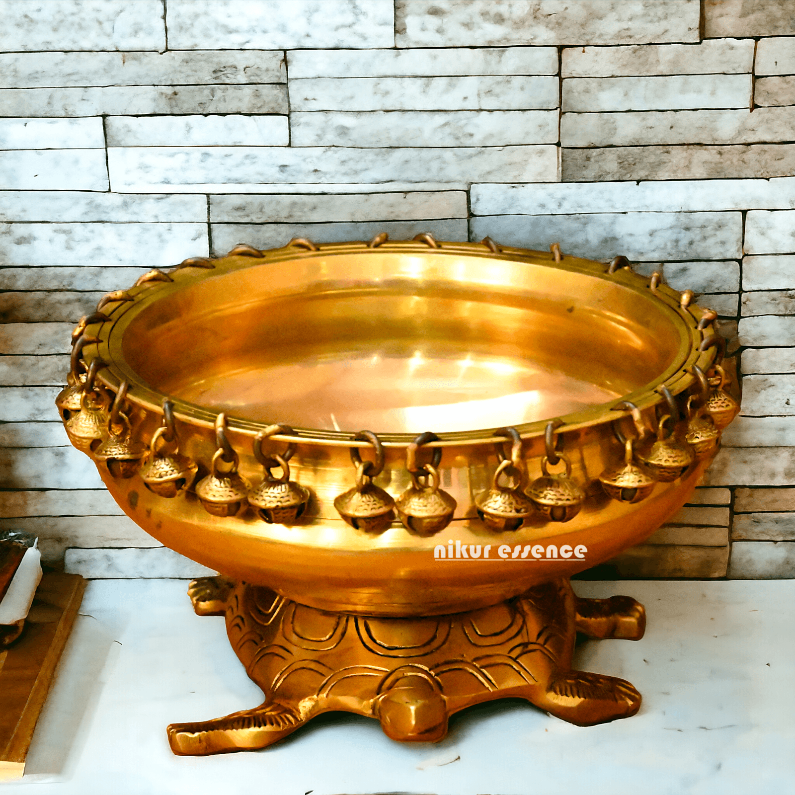 Buy online 8-Inch Traditional Brass Urli with Turtle Design - Handcrafted Decorative Bowl for Home Décor Nikuressence