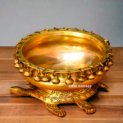 Buy online 8-Inch Traditional Brass Urli with Turtle Design - Handcrafted Decorative Bowl for Home Décor Nikuressence
