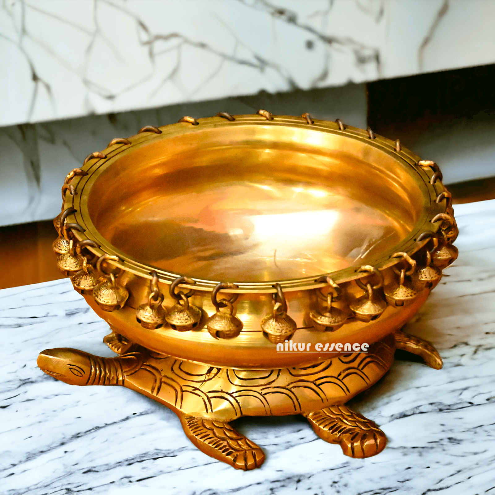 Buy online 8-Inch Traditional Brass Urli with Turtle Design - Handcrafted Decorative Bowl for Home Décor Nikuressence