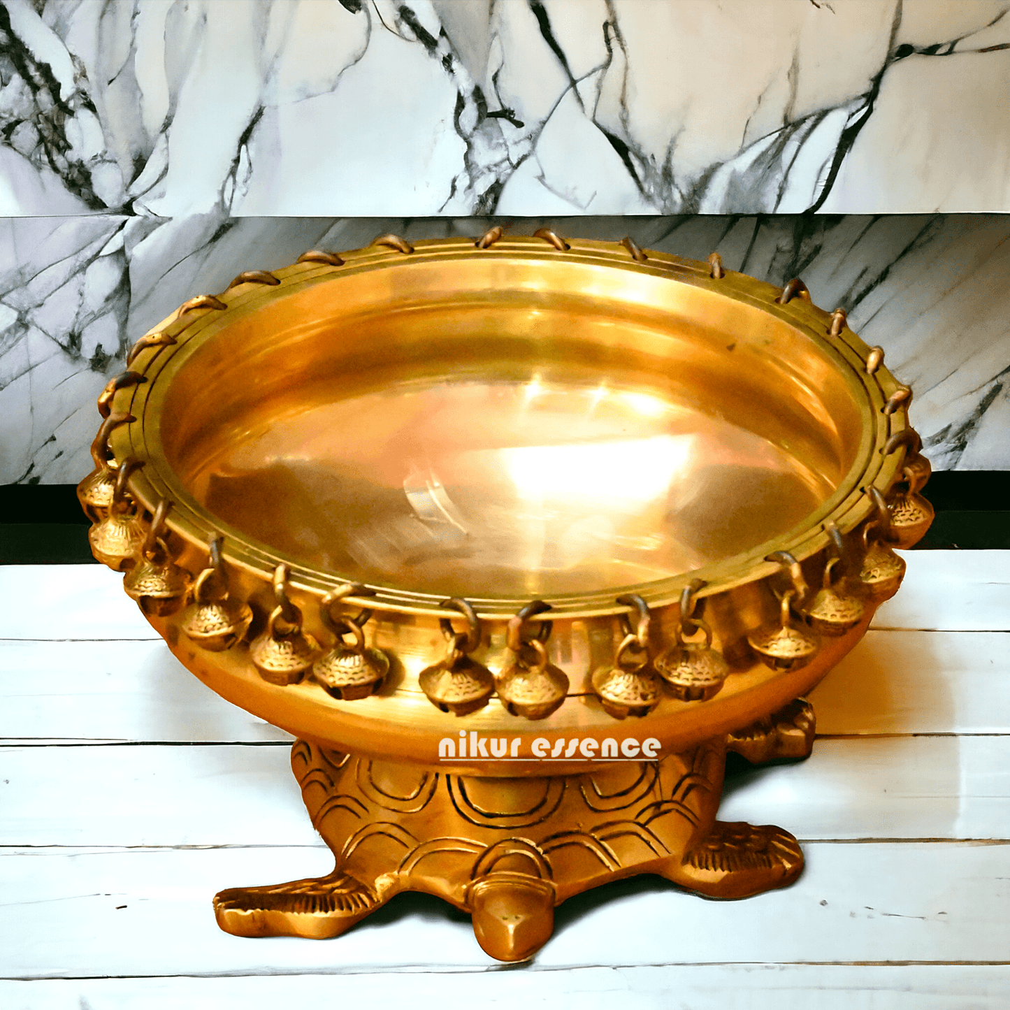 Buy online 8-Inch Traditional Brass Urli with Turtle Design - Handcrafted Decorative Bowl for Home Décor Nikuressence