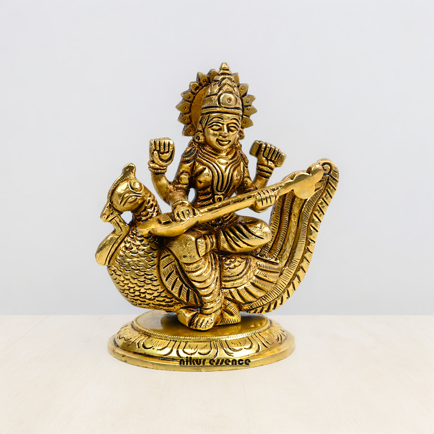 Beautiful Solid Brass saraswati sitting on swan statue by Nikur Essence - 4 Inch Nikuressence