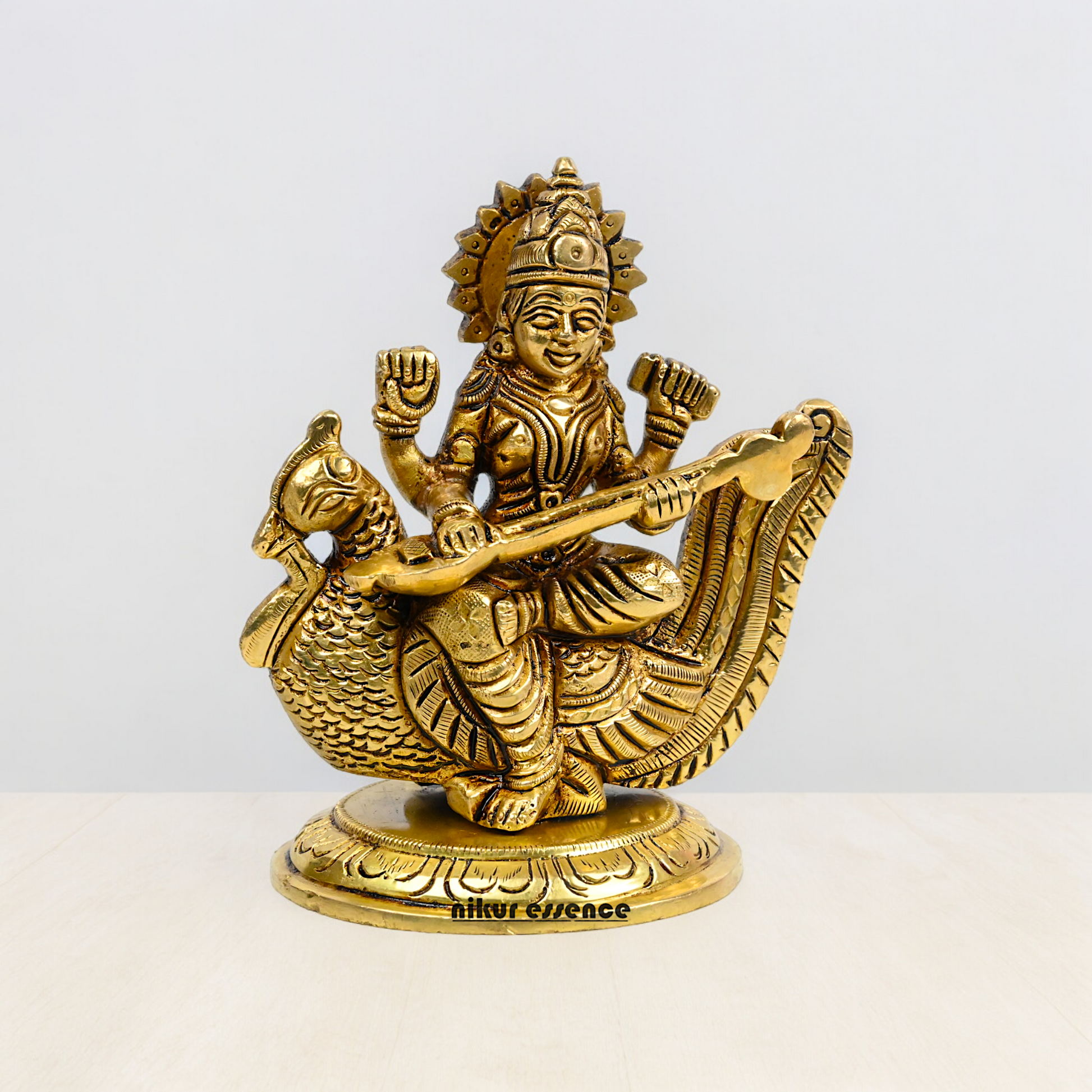 Beautiful Solid Brass saraswati sitting on swan statue by Nikur Essence - 4 Inch Nikuressence