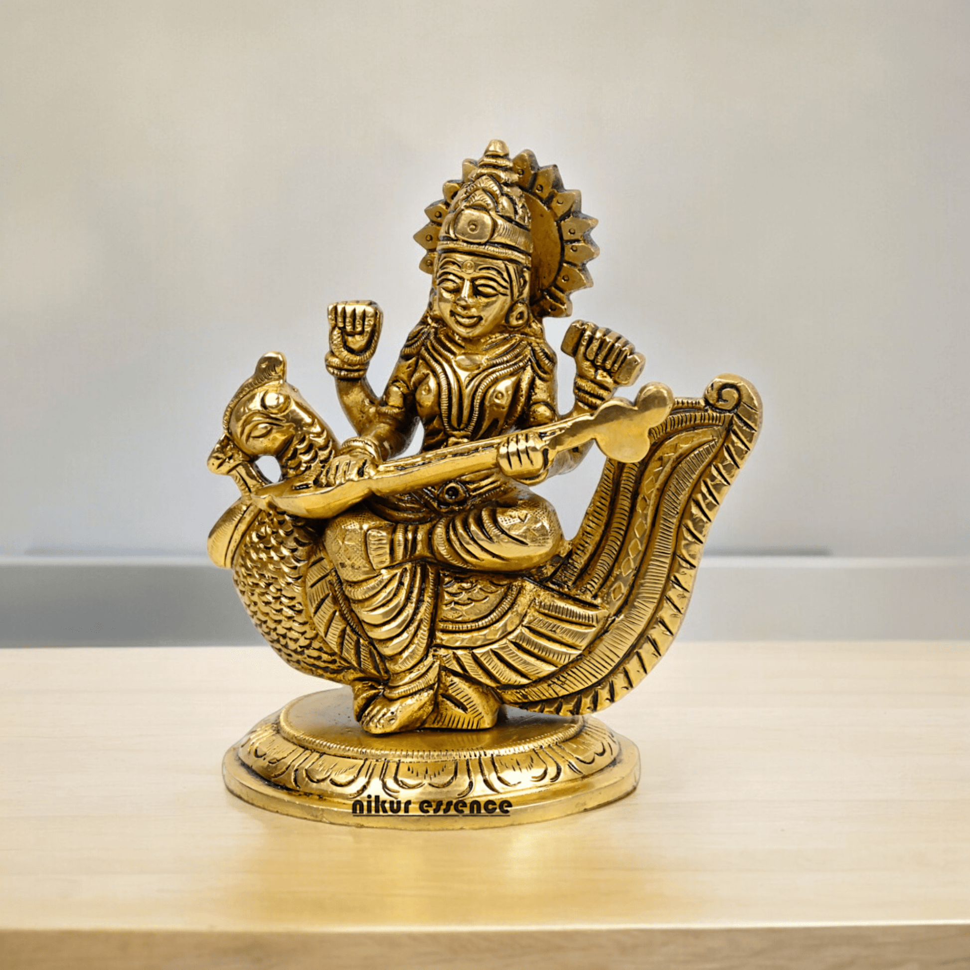 Beautiful Solid Brass saraswati sitting on swan statue by Nikur Essence - 4 Inch Nikuressence