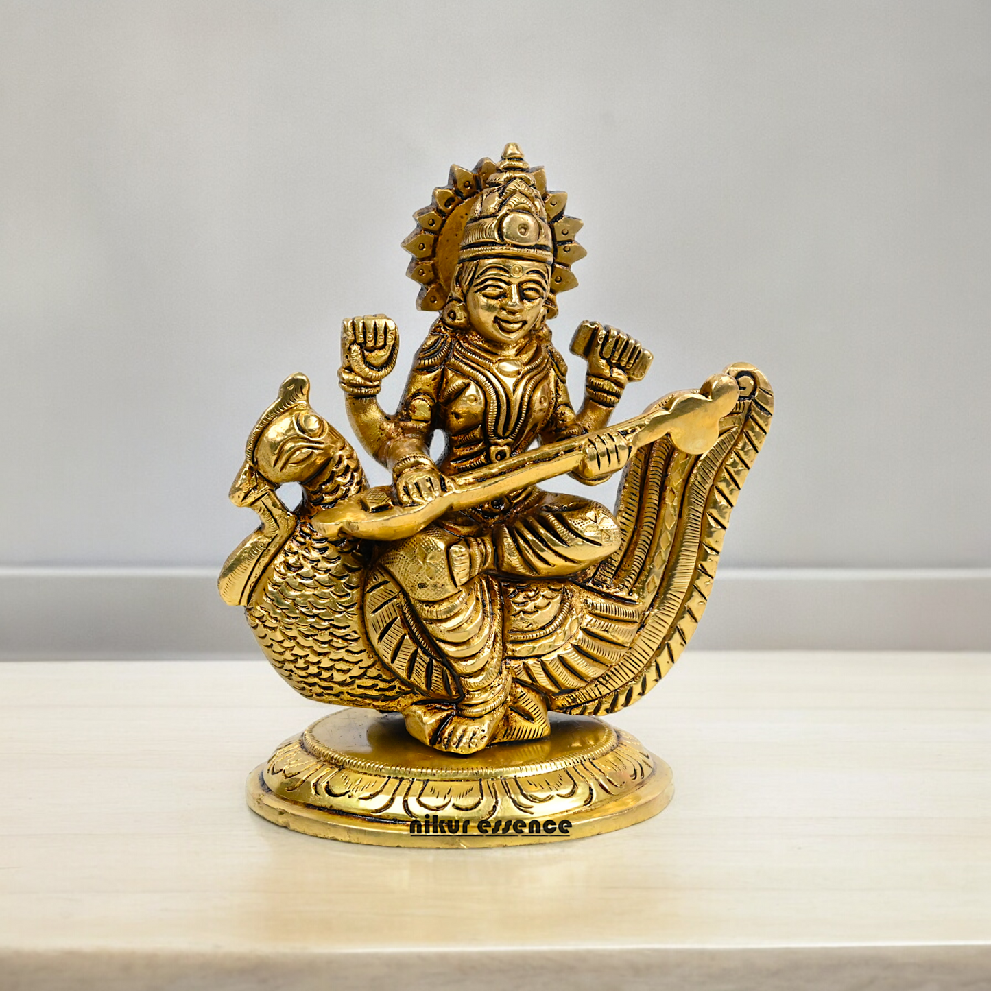 Beautiful Solid Brass saraswati sitting on swan statue by Nikur Essence - 4 Inch Nikuressence