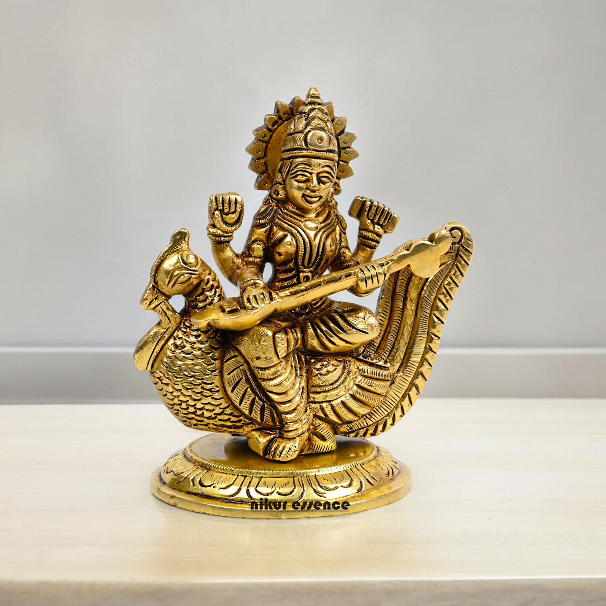 Beautiful Solid Brass saraswati sitting on swan statue by Nikur Essence - 4 Inch Nikuressence