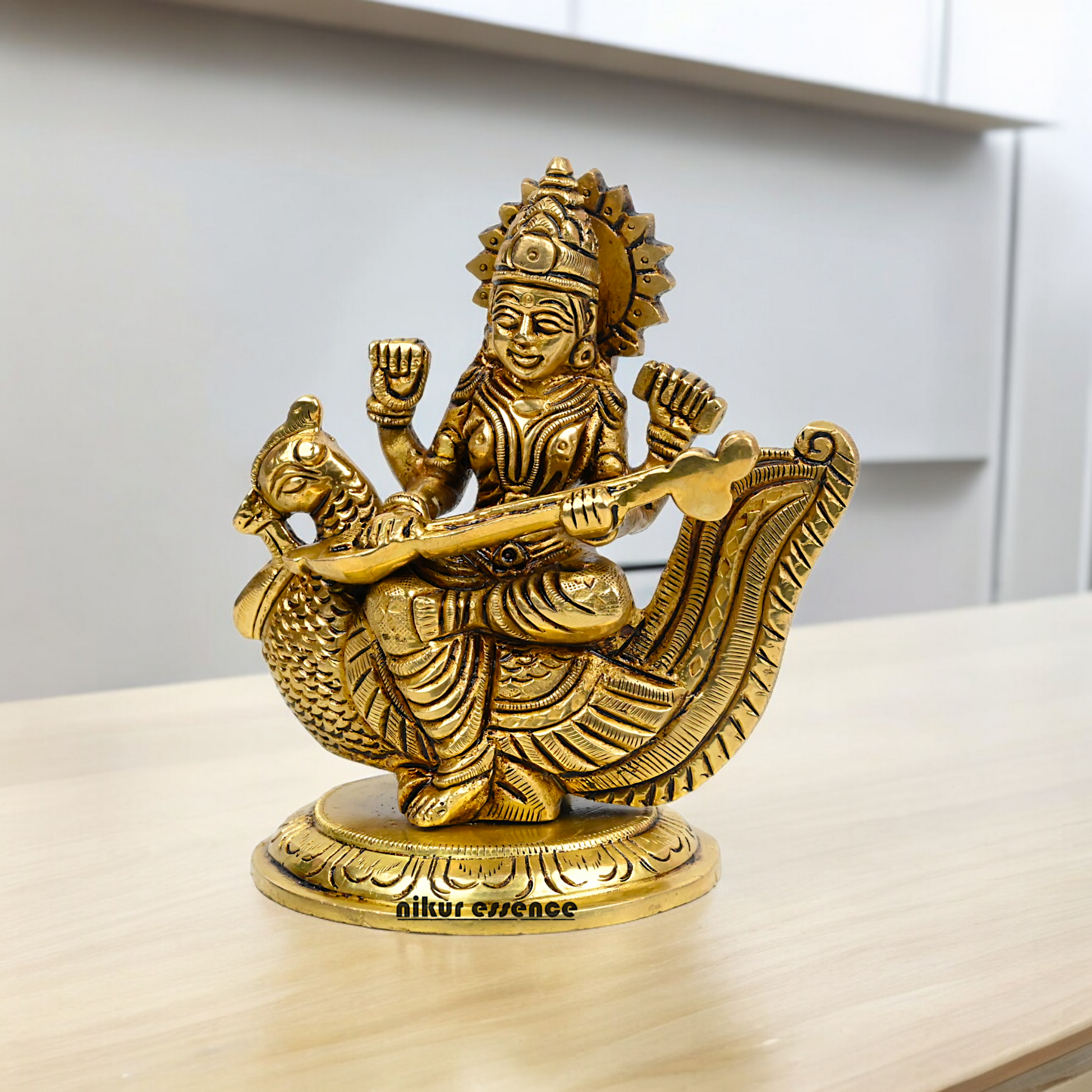 Beautiful Solid Brass saraswati sitting on swan statue by Nikur Essence - 4 Inch Nikuressence