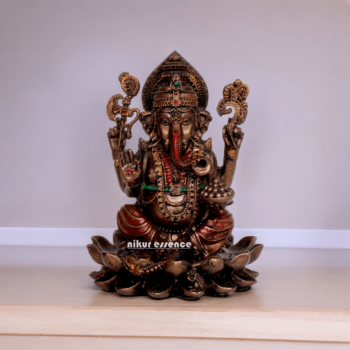 Bonded Bronze Ganesh sitting on lotus Nikur Essence - 4 inch Nikuressence