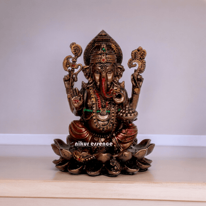 Bonded Bronze Ganesh sitting on lotus Nikur Essence - 4 inch Nikuressence