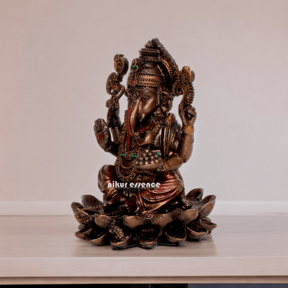 Bonded Bronze Ganesh sitting on lotus Nikur Essence - 4 inch Nikuressence