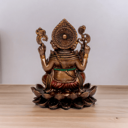 Bonded Bronze Ganesh sitting on lotus Nikur Essence - 4 inch Nikuressence