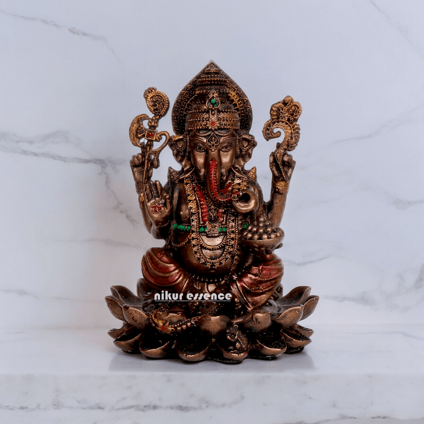 Bonded Bronze Ganesh sitting on lotus Nikur Essence - 4 inch Nikuressence