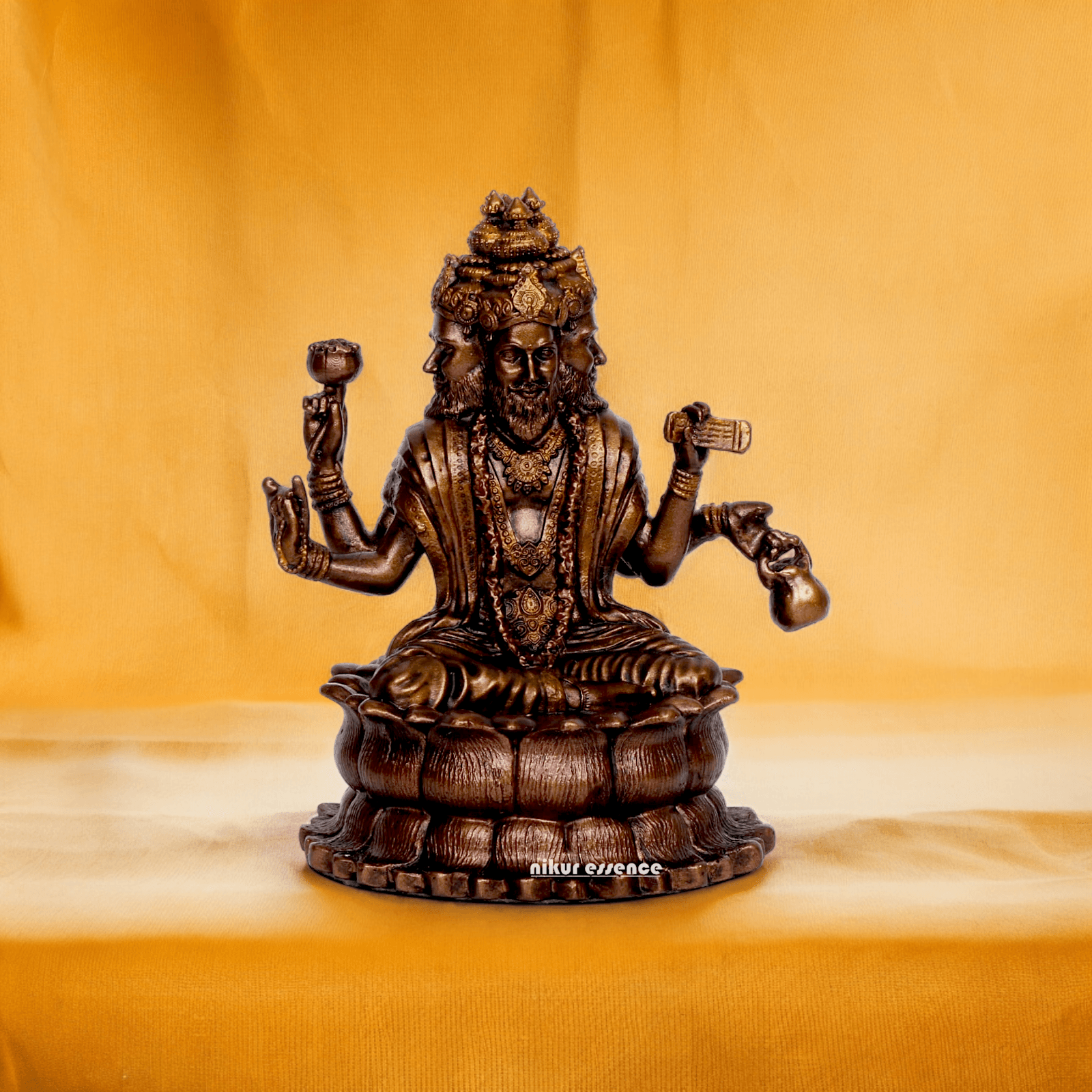 Bonded Bronze Trimurti Idol Depicting Brahma, Vishnu, and Mahesh on Lotus by Nikur Essence - 3.75 Inch Nikuressence
