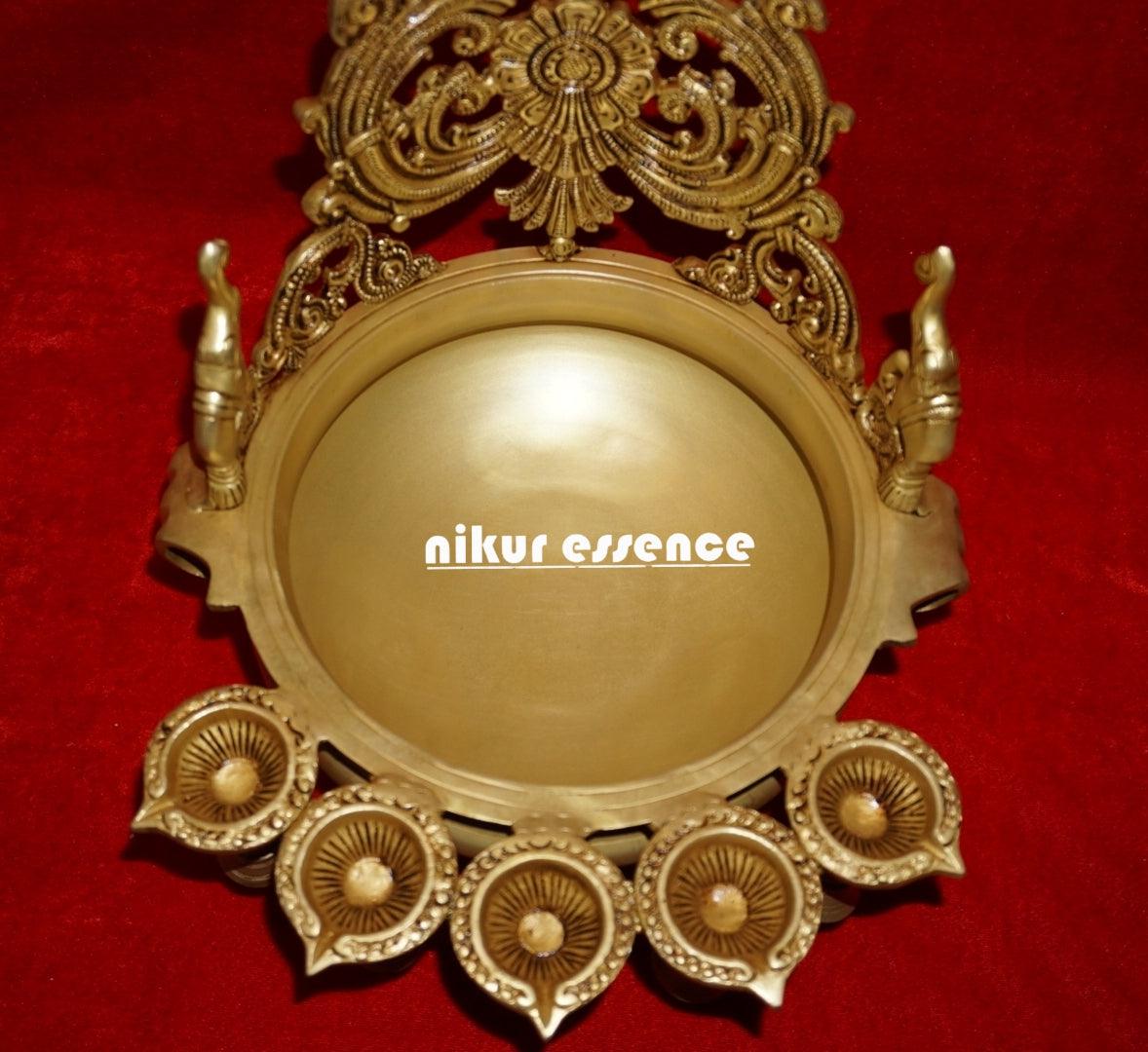 Buy Peacock Urli in brass with 5 Diyas for Spiritual Home Decor and Festive Celebrations nikuressence