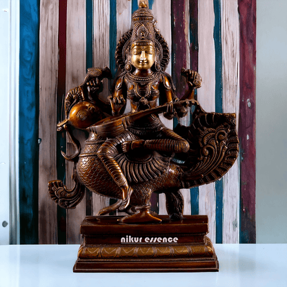 Saraswati Playing the Veena While Seated on a Grand Peacock, With a Parrot Gracefully Perched on Her Hand – Exquisite 20-Inch Handcrafted Figurine Nikuressence